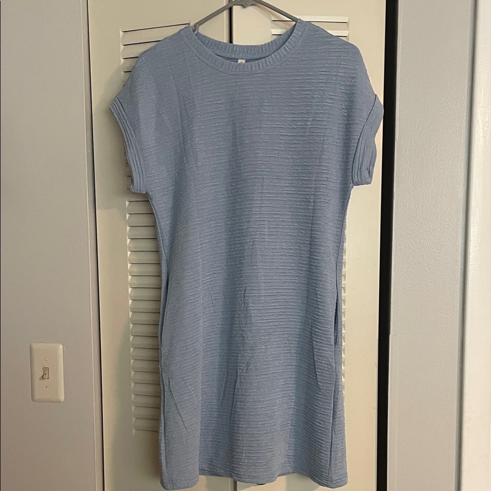 Light Blue Ribbed Knit Dress with pockets size small.